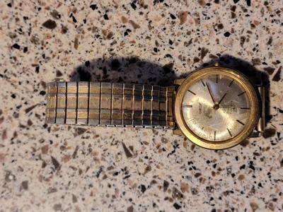 Two older watches in need of repair