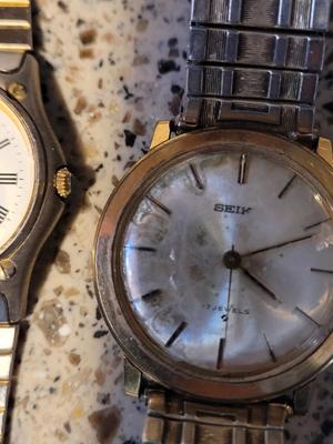 Two older watches in need of repair
