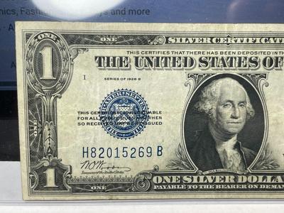 SERIES OF 1928-B FINE/VERY FINE CONDITION "FUNNY BACK" SILVER CERTIFICATE AS PICTURED.