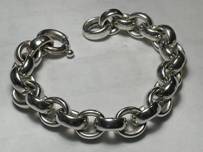 VINTAGE PREOWNED HEAVY 33.6 GRAMS STERLING SILVER 7.75" LINK BRACELET IN VERY GOOD PREOWNED CONDITION.