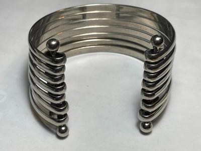 Vintage Preowned 7-Strand White Metal Cuff Bracelet Stamped Sterling/.925 but NOT in VG Condition as Pictured.