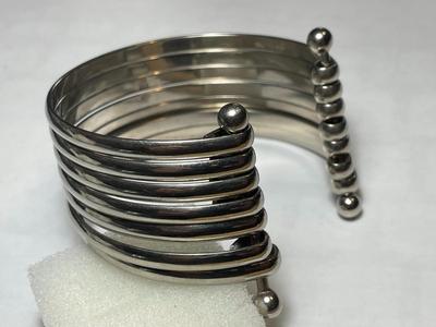 Vintage Preowned 7-Strand White Metal Cuff Bracelet Stamped Sterling/.925 but NOT in VG Condition as Pictured.