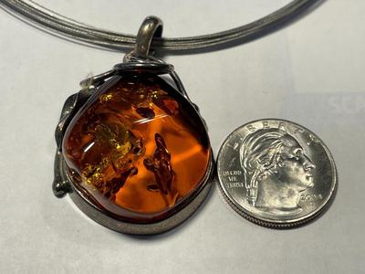 New Never Worn Large Baltic Amber Bezel Set in Sterling Silver on a Sterling Cable 18" Necklace as Pictured.