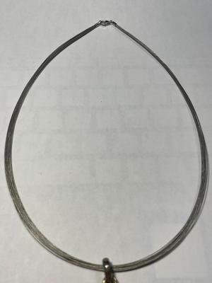 New Never Worn Large Baltic Amber Bezel Set in Sterling Silver on a Sterling Cable 18" Necklace as Pictured.