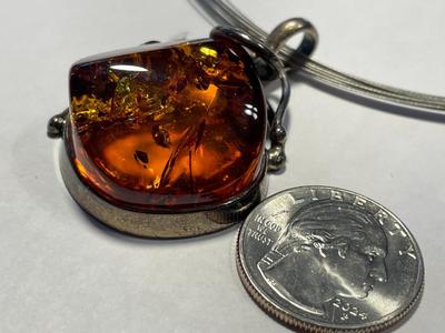 New Never Worn Large Baltic Amber Bezel Set in Sterling Silver on a Sterling Cable 18" Necklace as Pictured.