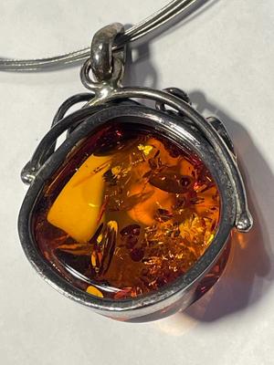 New Never Worn Large Baltic Amber Bezel Set in Sterling Silver on a Sterling Cable 18" Necklace as Pictured.