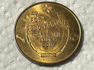 VINTAGE 1928 THURSTON THE MAGICIAN BRONZE LUCKY COIN TOKEN IN AU/UNCIRCULATED CONDITION AS PICTURED.