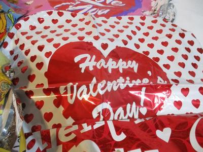Assortment Of Helium Balloons With Sticks