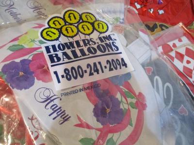 Assortment Of Helium Balloons With Sticks