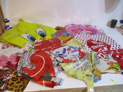 Assortment Of Helium Balloons With Sticks