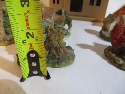 Assortment Of Home Figure Decor