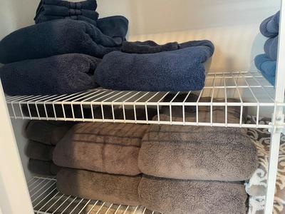 Linen closet full of Towles, blankets, misc linens