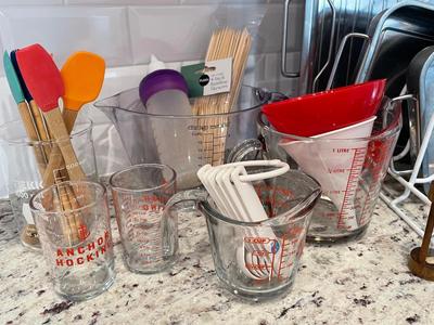 Misc Kitchen lot W/ scale, measuring cups, pans, spatulas