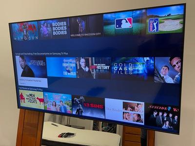 Samsung 55” Smart TV w/ remote and stands