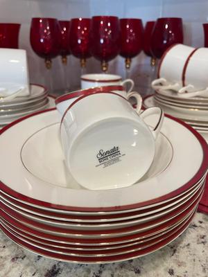 Complete dinner place setting for 8