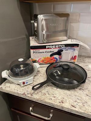 Kitchen items cast iron, pressure cooker, toaster, egg cooker