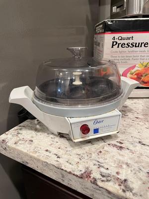 Kitchen items cast iron, pressure cooker, toaster, egg cooker