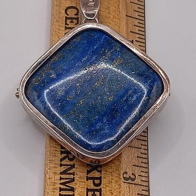 LOT 9: Lapis and Blue Topaz Pendant Set in 925 Sterling 29.8gtw on a 925 Sterling Choker 9.7g
