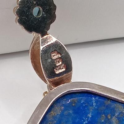 LOT 9: Lapis and Blue Topaz Pendant Set in 925 Sterling 29.8gtw on a 925 Sterling Choker 9.7g