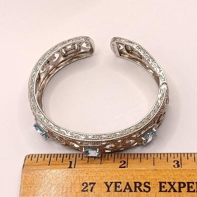 LOT 10: ISP 925 Sterling China Hinged Cuff with Blue Topaz Stones 39.4gtw
