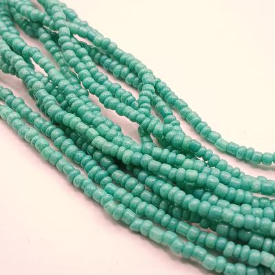 LOT 16: Oxidized Copper and Stone Necklace, Multi-Strand Turquoise Bead Necklace, Silk Thread Wrapped Bangles & More