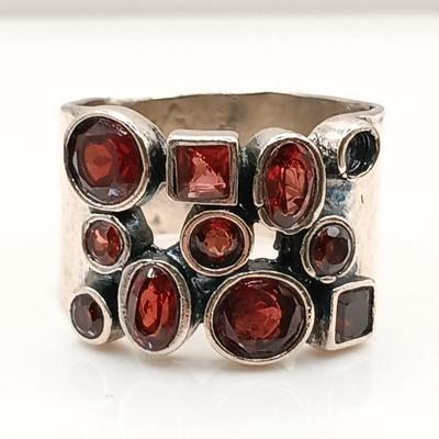 LOT 26: BH 925 Sterling Heart Ring 13.39g, 950 Flower Ring 10.73g & Israel 925 Ring with Garnet-Tone Stones 7.94g