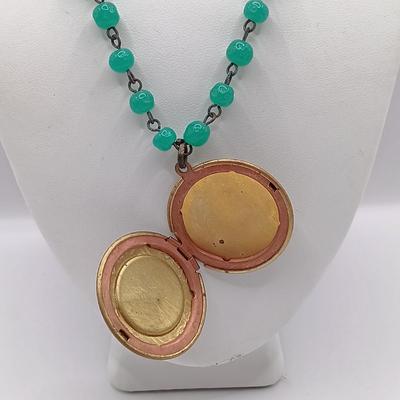 LOT 141: LVP France LA Vie Parisienne Purse Charm Necklace, Matryoshka Doll Locket Necklace and Vintage Fashion Earrings