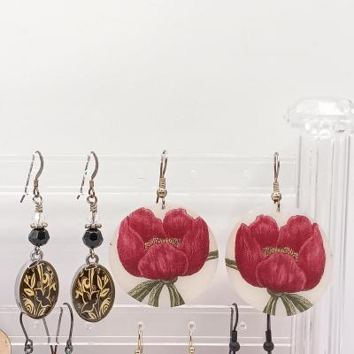 LOT 141: LVP France LA Vie Parisienne Purse Charm Necklace, Matryoshka Doll Locket Necklace and Vintage Fashion Earrings