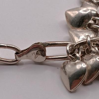 LOT 142: Sterling 925 Heart Charm Bracelet 46.04g