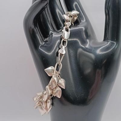 LOT 142: Sterling 925 Heart Charm Bracelet 46.04g