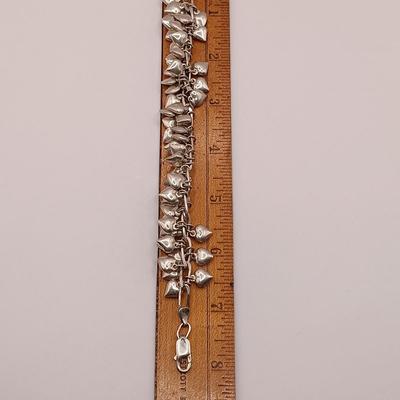 LOT 142: Sterling 925 Heart Charm Bracelet 46.04g