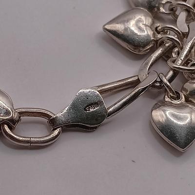 LOT 142: Sterling 925 Heart Charm Bracelet 46.04g