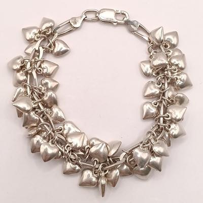 LOT 142: Sterling 925 Heart Charm Bracelet 46.04g