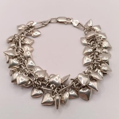 LOT 142: Sterling 925 Heart Charm Bracelet 46.04g