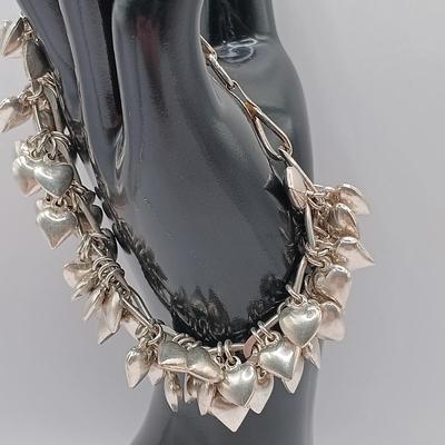 LOT 142: Sterling 925 Heart Charm Bracelet 46.04g
