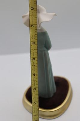 Vintage Porcelain Nun with Velvet Stand