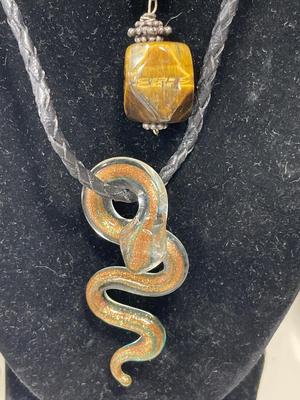 3 Cord or leather necklaces