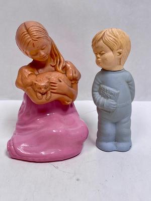 Boy and girl figuring perfume bottles,Avon