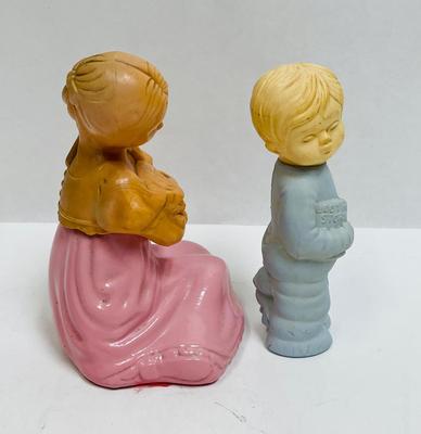Boy and girl figuring perfume bottles,Avon