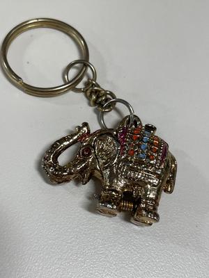 Keychains, tape measure and pins