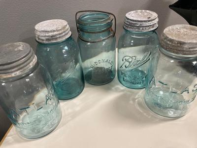 Vintage blue glass canning jars