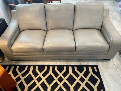 Beautiful gray leather sofa