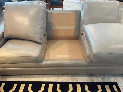 Beautiful gray leather sofa