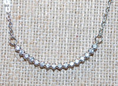 16 Stone Diamond Style Swag on a Silver Tone Necklace Chain 17" L