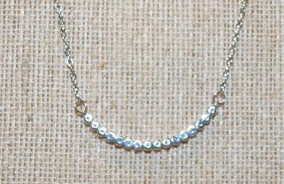 16 Stone Diamond Style Swag on a Silver Tone Necklace Chain 17" L