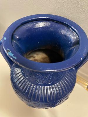 Tall blue pottery vase and cobalt blue glass