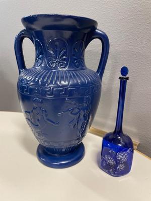 Tall blue pottery vase and cobalt blue glass