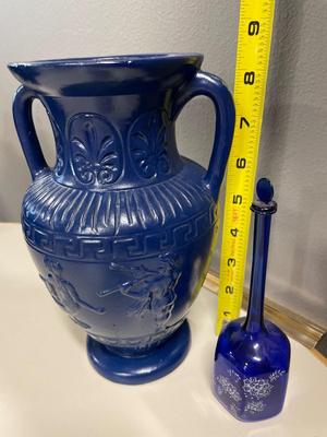 Tall blue pottery vase and cobalt blue glass