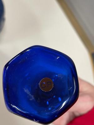 Tall blue pottery vase and cobalt blue glass