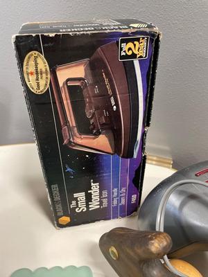 Massagers with vintage travel iron